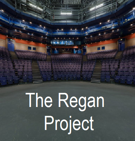 A stage which is empty except for a single chair and a caption which reads <i> The Regan Project </i>.